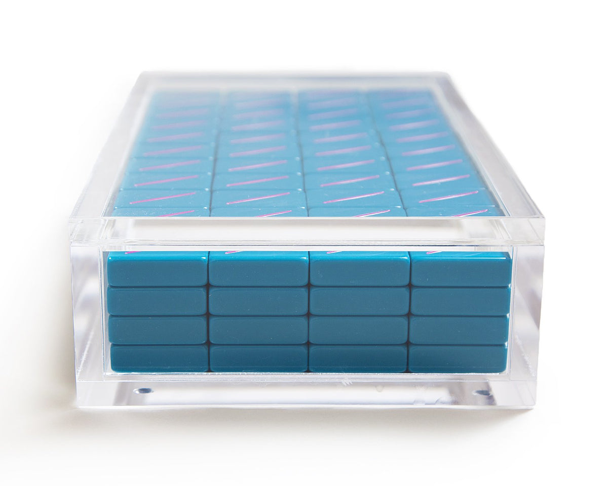 A custom sized acrylic display box to perfectly store The Mahjong Line tile sets.