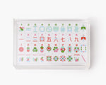 A clear acrylic display box with a removable lid. The acrylic box stores The Mahjong Line mahjong tile set.