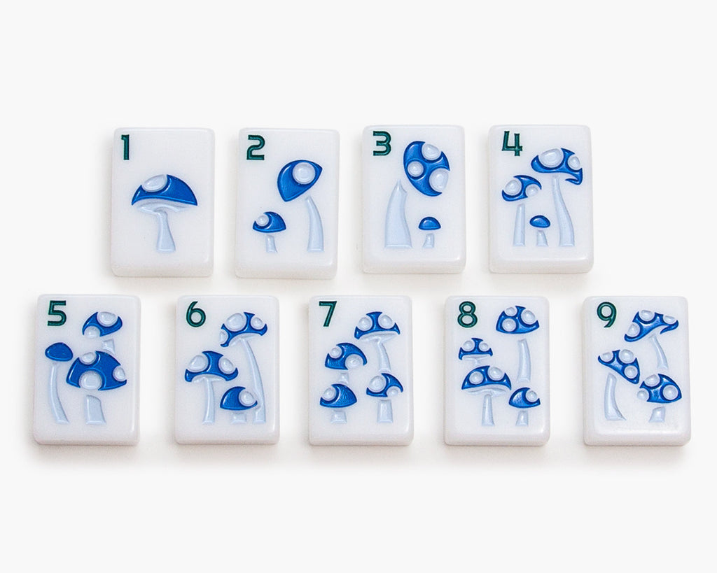 The Mahjong Line releases a new American mahjong tile set called the Joshua Tree. The mah jongg tiles are white tile and the dots are mushrooms.
