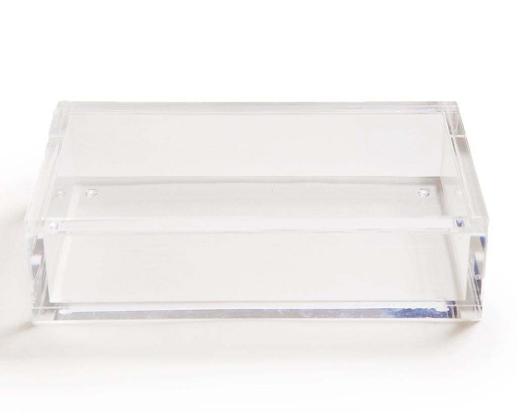 A clear acrylic display box with a removable lid. The acrylic box stores The Mahjong Line mahjong tile set.