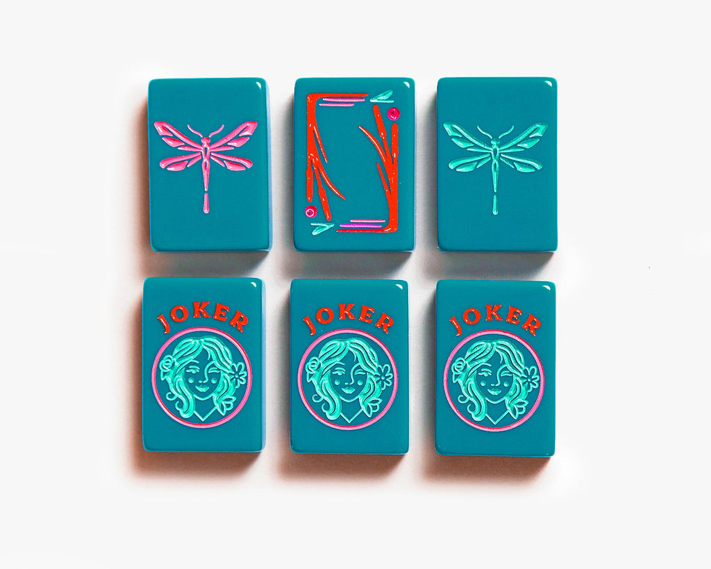 American Mahjong Tile Set to play the game of mahjong. Custom mahjong dragons & jokers tiles is from the botanical line featured in a deep teal.