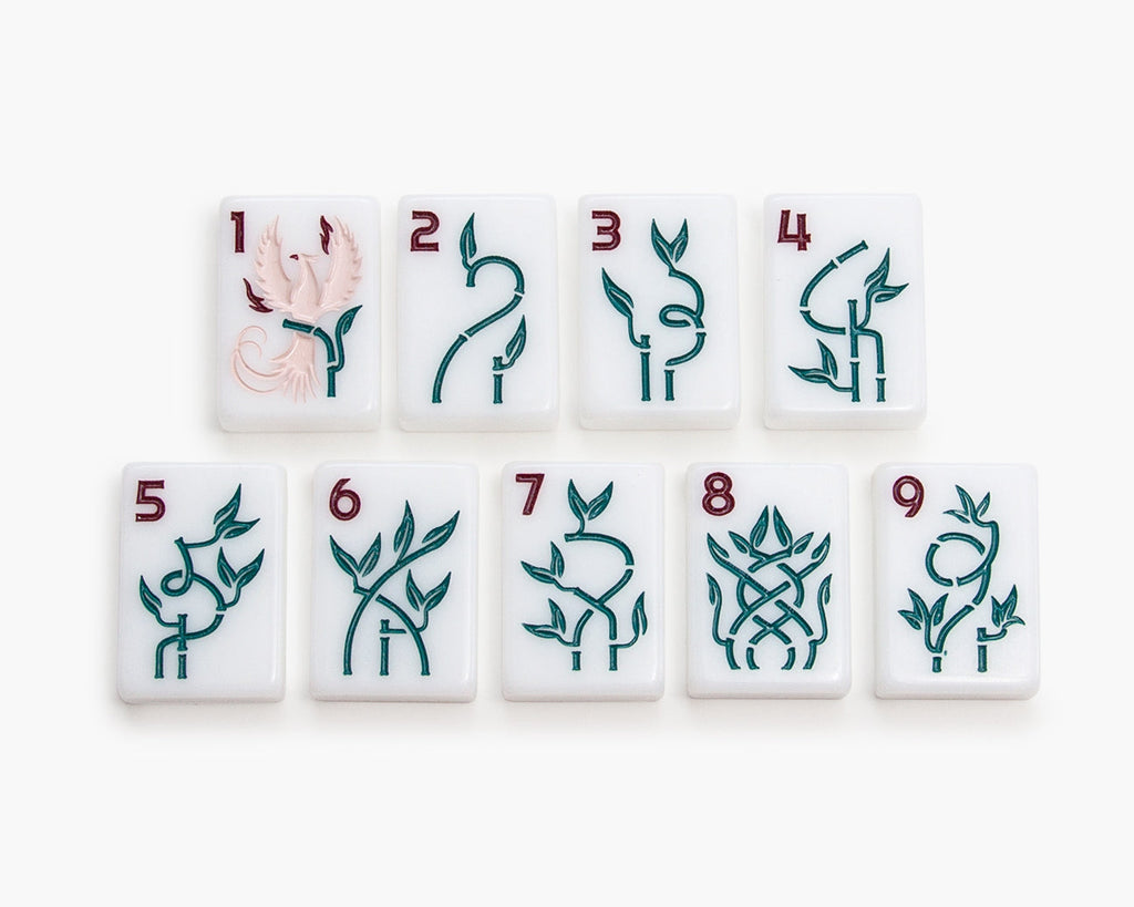 The Mahjong Line releases a new American mahjong tile set called the Joshua Tree. The mah jongg tiles are white tile and the bams are green with a Phoenix bird as the bird bam.