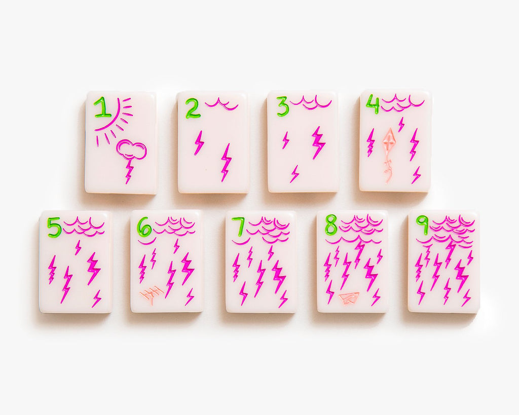 American Mahjong Tile Set to play the game of mahjong. This custom mahjong cracks tiles is from the cheeky line featured in a millennial pink.